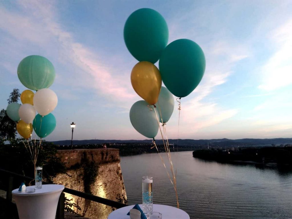 Late summer evening with balloons floating over the river. Late summer evening with balloons floating over the river